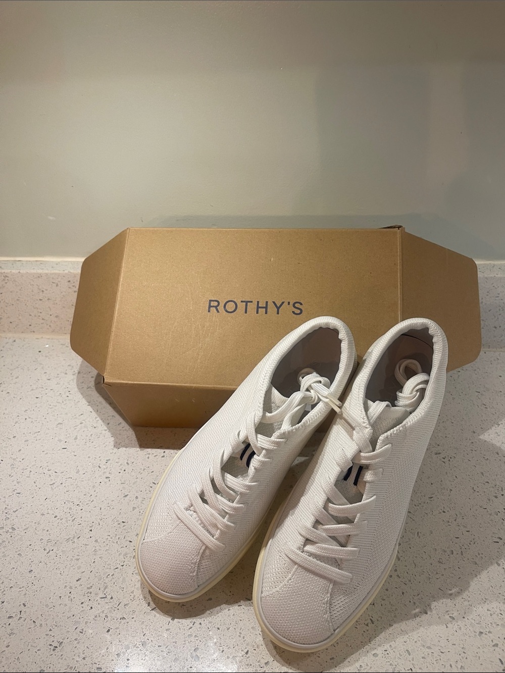 Rothy's 'The Lace Up' sneakers in white, crafted from recycled knit